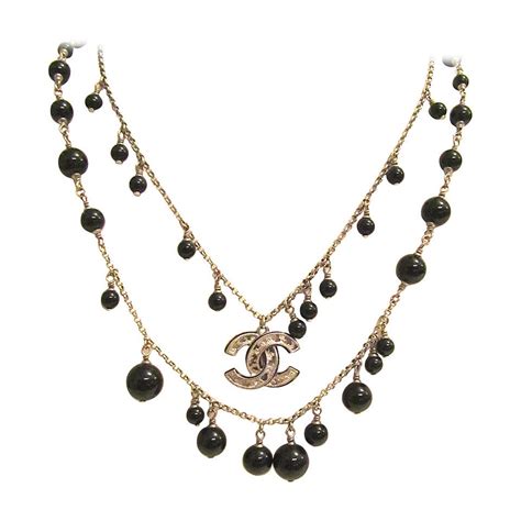 chanel copper and black necklance with glass beads|chanel jewelry.